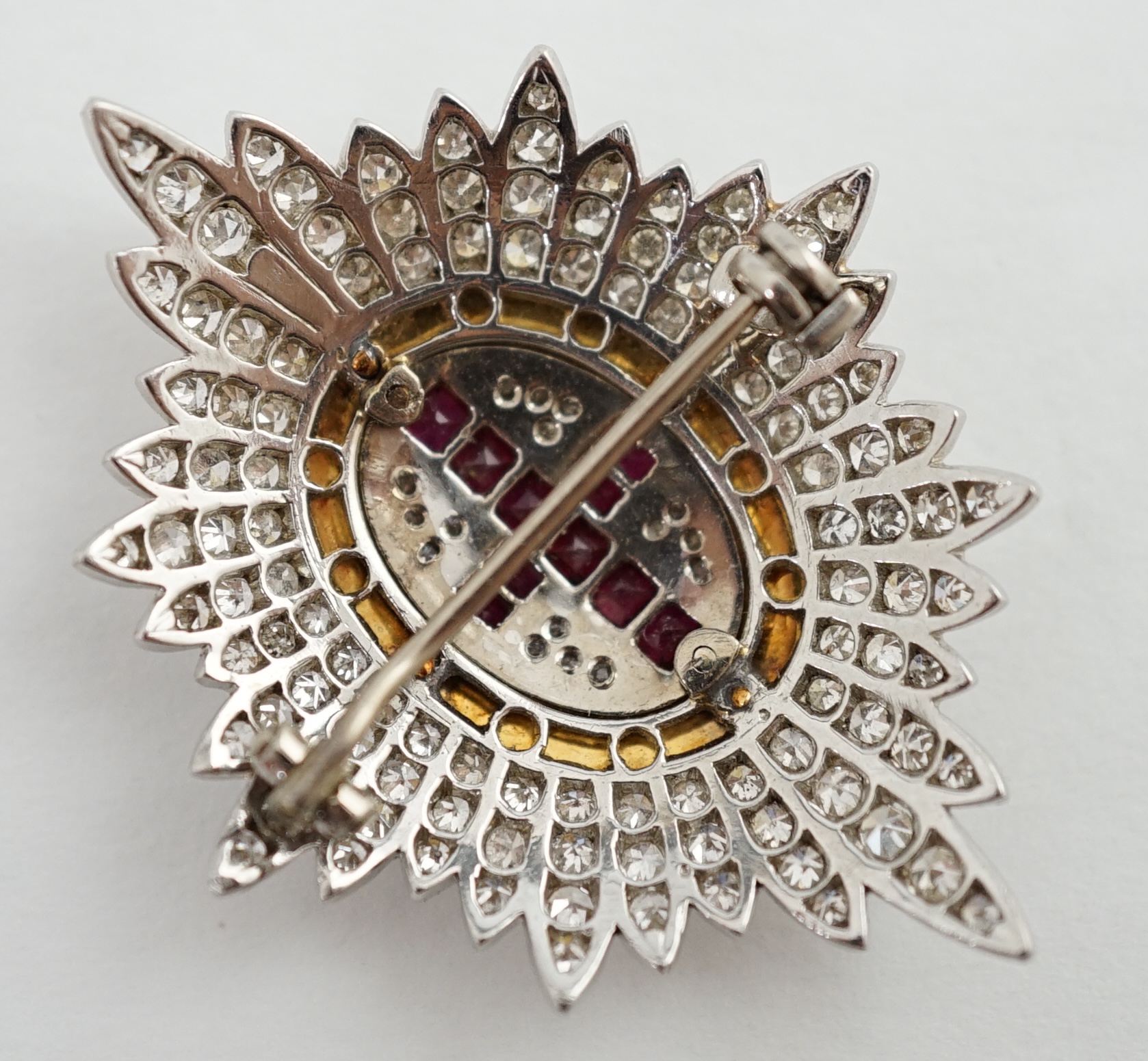 An 18ct gold, platinum, diamond, enamel and ruby Order of the Garter brooch